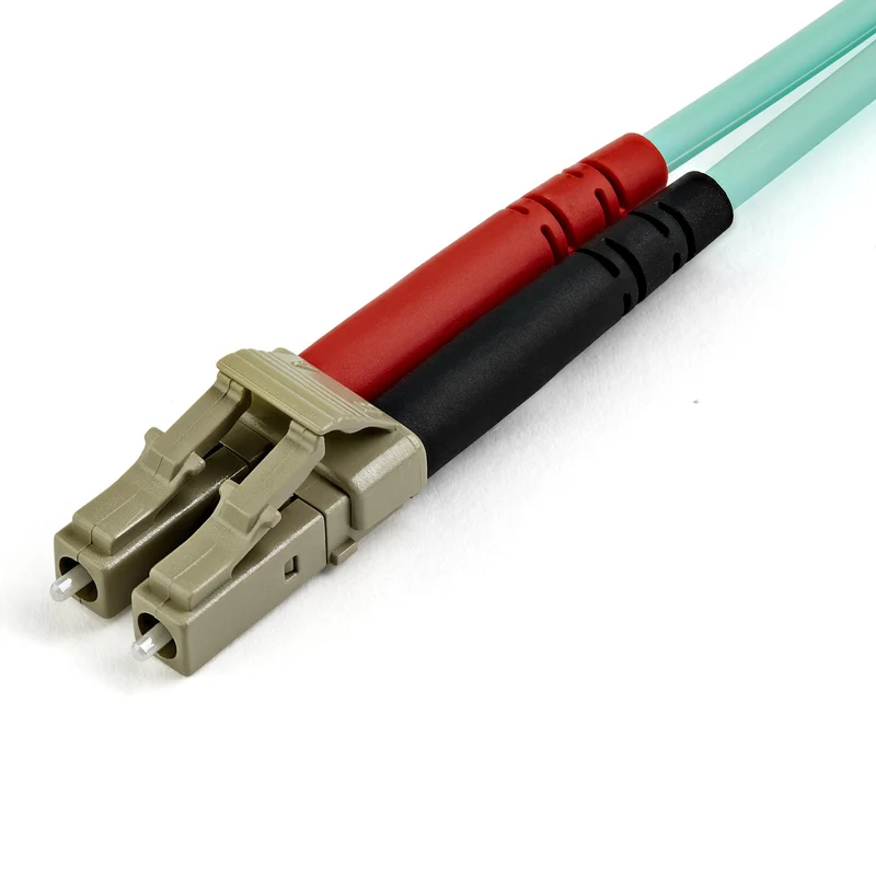 StarTech.com Cavo in fibra ottica multimodale da LC/UPC a LC/UPC OM4 da 7 m - Fibra LOMMF/VCSEL Zipcord da 50/125 µm, Reti 100G - Bassa perdita di inserzione - Cavo patch in fibra LSZH - Turchese
